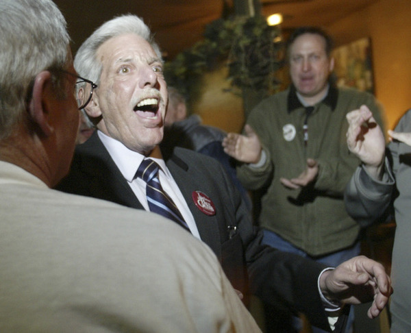 William D. Lewis the Vindicator  Paul Gains wins prosecutors race. He gets congrats  at election night party at Cafe Cimmento in Youngstown.