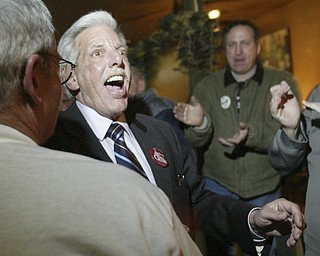 William D. Lewis the Vindicator Paul Gains wins prosecutors race. He gets congrats at election night party at Cafe Cimmento in Youngstown.