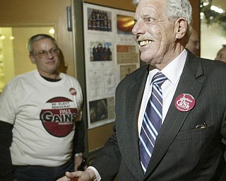 William D. Lewis the Vindicator Paul Gains wins prosecutors race. He gets congrats at election night party at Cafe Cimmento in Youngstown.