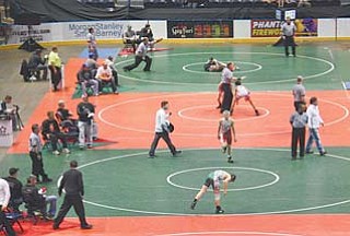 More than 800 junior high wrestlers competed Saturday and Sunday in the state tournament at the Covelli Centre. Saturday’s action drew a sellout crowd.