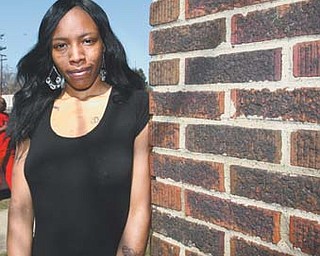 Damona Walker says she won’t return to her South Side Youngstown home until police catch the two men who pulled a gun on her and her children.