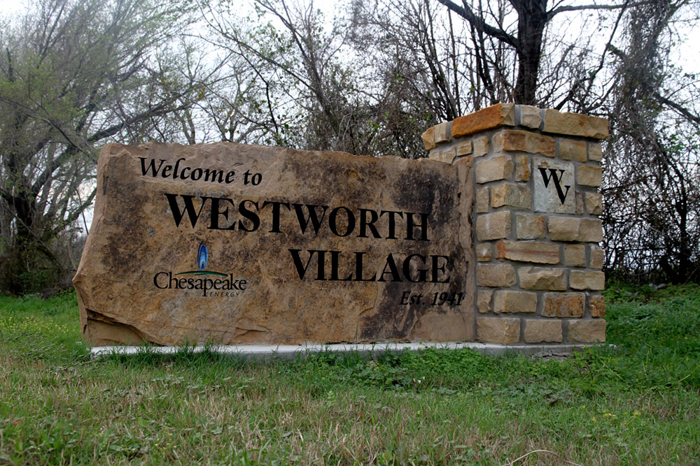 The sign for Westworth Village in North Central Texas bears the logo of Oklahoma City-based Chesapeake Energy Corp., the second-largest producer of natural gas in America.