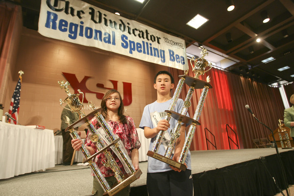 ROBERT  K.  YOSAY  | THE VINDICATOR --..Second and First Place winners Tamsin Day and Max Lee -  The 79th  Regional Spelling Bee sponsored by the Vindicator was held at YSU Kilcawley Center with 65 spellers vieing for the coveted trophy and trip to Washington for the National Spelling Bee s--30-..(AP Photo/The Vindicator, Robert K. Yosay)