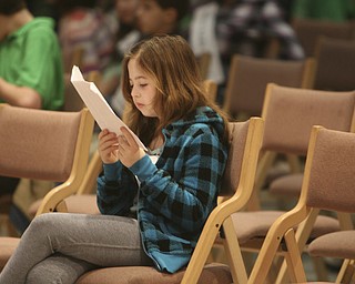 ROBERT  K.  YOSAY  | THE VINDICATOR --..Tessa Durrett of Struthers Elementary  studied  just before the start of The 79th  Regional Spelling Bee sponsored by the Vindicator was held at YSU Kilcawley Center with 65 spellers vieing for the coveted trophy and trip to Washington for the National Spelling Bee s--30-..(AP Photo/The Vindicator, Robert K. Yosay)
