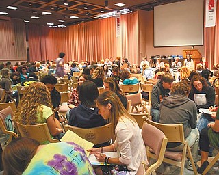 Students from throughout the Mahoning Valley and western Pennsylvania participate in the Youngstown State University English Festival’s writing game. Groups of four or five students had to write a parody of one of the seven books they read for the 34th annual festival.