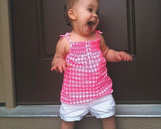 Now that is one happy baby! Picture sent in by Richard Pesce.