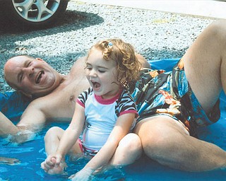 Who's having more fun? Here is Gary Offerdahl enjoying the pool with his granddaughter Lila Yankush. Photo sent in by Karen Conklin of Youngstown.