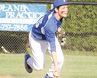Poland shortstop Nicholas Maillis (25) scoops the ball and prepares to toss it to second base to force an
out in the third inning of Monday’s game against Austintown Fitch. The Bulldogs won the AAC game 13-11.