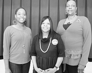Photo by Jessica M. Kanalas | The Vindicator: Delta Sigma Theta Sorority alumnae are getting ready to step out in the name of health. Their third annual adults-only health fair is being planned for May 5 at Williamson Elementary School in Youngstown. Committee members include event chairwoman Marcia Haire-Ellis, at right, and Chantelle Hallman, left. Williamson School Principal Wanda Clark is in the center.