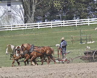 William D Lewis The Vindicator An Amish man works his fields in Wilmington Twp.