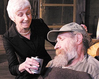 Molly Galano and Sam Perry play a husband and wife in the family drama “Buried Child” at the Youngstown Playhouse.