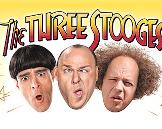 Chris Diamantopoulos, left, Will Sasso and Sean Hayes star in “The Three Stooges.”