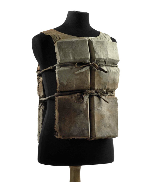 This photo provided by Christie's auction house shows a life preserver from the ill-fated R.M.S. Titanic found during the initial search for survivors and owned by the same family for 90 years.  Going on the auction block in June, it is the first Titanic life jacket to be offered at auction in the United States, and is one of about six believed to have survived to this day, Christie's said Thursday, May 29, 2008. (AP Photo/Christie's Images, Ltd.)