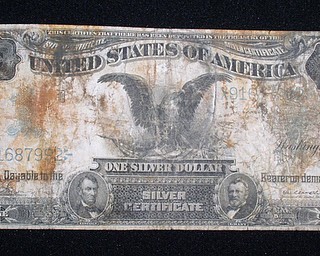 Currency, is shown as part of the artifacts collection at a warehouse in Atlanta, Friday, Aug 15, 2008. The 5,500-piece collection contains almost everything recovered from the wreckage of the RMS Titanic, which has sat 2.5 miles below the surface of the Atlantic ocean since the boat sank on April 15, 1912. (AP Photo/RMS Titanic, Inc.)