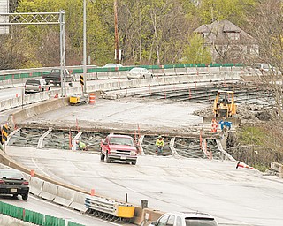 Construction crews pull off old bridge decks to build new ones along Interstate 680 northbound between South Avenue and Market Street. Two projects on the interstate cost about $19 million. The entire seven-bridge project on I-680 is projected to be completed in July 2013.