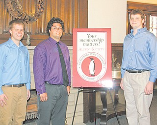 From left, Joseph Cochran of Pulaski, Pa., Michael Giambattista of Canfield and Taylor Brandt of Leavittsburg are honored as Alumni Legacy scholarship recipients at the YSU Alumni House on Sunday.