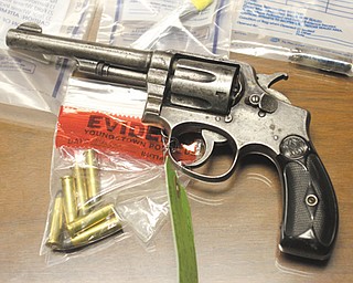 Law enforcement confiscated this revolver during last weekend’s Operation Shield initiative. The gun was one
of several police rounded up and put on display during a Tuesday press conference.