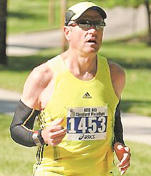 Facing a health crisis, Ken Smith went on a strict weight-loss regimen and was inspired to start a regular schedule of full- and half-marathons.