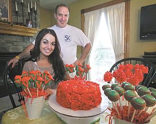 Fitch senior Alexa Diana, 17, with the help of her father, Pat Diana, has baked and decorated nearly 100 Kentucky Derby-themed cake pops that are being taken to Churchill Downs for Saturday’s race. Among the fans of Alexa’s Lil Baby Cakes business is the family of Youngstown businessman Bruce Zoldan. Zoldan is part-owner of the thoroughbred Went the Day Well, which is one of the 21 horses in this year’s race.