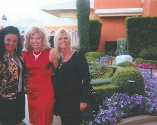 In this photo from April, Deborah Carissimi, left, Terri Goldner and Carla Carissimi pause in the Las Vegas flower gardens at The Wynn Resort. Photo sent in by Deborah Carissimi of Boardman.