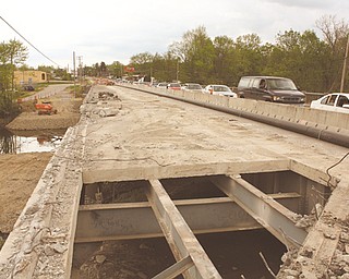 Motorists experienced some delays Friday afternoon on the Parkman Road Northwest bridge over the Mahoning River in Warren as a result of the $4.6 million construction project being carried out to replace the bridge. The project most likely will continue into 2013.