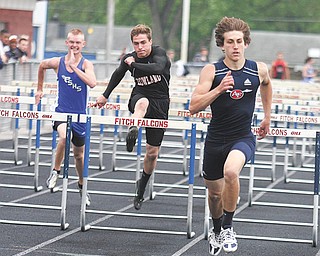 Fitch sophomore Sam Ortz, right, pulls away for the victory in the 110-meter hurdles at Tuesday’s All-American Conference American Division track meet at Fitch High School.