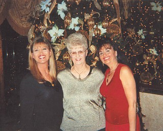 A cancer survivor, JoAnn Carissimi, mother to Carla (left) and Deborah Carissimi, all of Boardman, "... still manages to grow the most beautiful flowers in her gardens and creates the most beautiful artwork," says Deborah.
