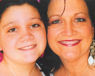 Julie Carino, 10, wrote this about her mom, Gayle Carino: "With me and my mom we don't have a favorite memory. We make new ones every day. So manny I've lost count. Theres just not enough word to describe her. Like beautiful she gives it a whole new meaning. I love my mom without explanation." They live in Austintown.