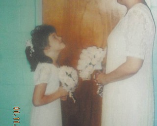 This photo was taken 10 years ago of Heather Atkinson and her mother, Sharon Pink, both of East Palestine, at Sharon's wedding. Heather, now 18, says her mom has been her best friend her whole life, and that "being her baby and only child, we look forward to the day this photo can be taken again ... at my wedding."