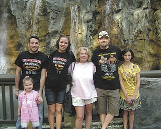Cassidy Ross submitted this photo of her family, taken in Las Vegas last Christmas. She says her mom, center, is her inspiration because she's devoted her life to taking care of children — almost 300, in fact. For 36 years, her mom has been a foster mom. There are now five children in the family: Geo, 40; Chris, 22; Cassidy, 15; Marie, 13; and Rose, 6.