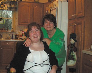 Kayla Walker says helping her face the challenges brought on by cerebral palsy has left no doubt that her mom, Sharon Walker is her best friend. Her mom "is always there when I need a hug," Kayla says.