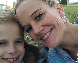 At almost 9 years old, Summer Bailing, who faces the challenge of having a disability, already knows how much she appreciates and loves her mom, Krystal Smith. "She helps me everyday to do my exercises so that I can walk on my own someday. Her smiling face helps me get out of bed in the morning," writes Summer. They live in Poland.