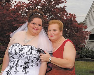 "My mother, Peggy Brewer, is my best friend. She has raised me as a single mother, always going without so that I could have what I wanted or needed. She is there for me no matter what and I can't imagine my life without her," writes Lisa Kuty about her mother. Both women are from Girard.