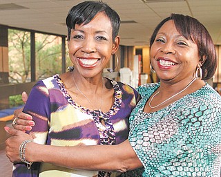 Jeannine Baker, left, and her mother, Bea Baker, embrace at Youngstown State University. Both will earn their master’s degrees in social work during spring commencement ceremonies Saturday at Beeghly Center. The undergraduate ceremony is 10 a.m.; the graduate ceremony is at 2:30 p.m.