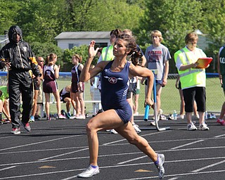 Jenna Yacovone of Austintown Fitch runs her leg of the 4x200 meter relay during Fridays Division one district championship track meet at Austintown Fitch High School. Dustin Livesay  |  The Vindicator