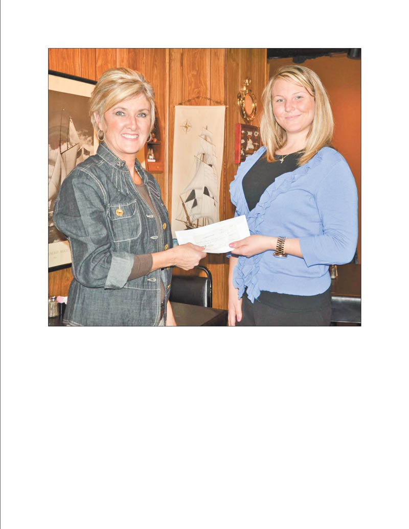 Lori Everly, left, president of the Columbiana Area Business and Professional Women’s Group, recently presented a check in the amount of $200 to Casey Bertolette, development associate for Beatitude House in Youngstown. CAPBW also supports Christina House in Columbiana and Buckeye Girls State programs. It also is donating three $1,500 scholarships to area high school seniors. For information about the group contact Everly at leverly1101@aol.com.