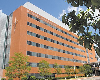 An exterior photograph of Humility of Mary Health Partners’ St. Elizabeth Boardman Health Center, which will be expanded with a seven-story patient tower beginning this fall. The $100.7 million project is part of $203.3 million investment at its facilities in Mahoning, Trumbull and Ashtabula counties that was announced by HMHP on Monday .