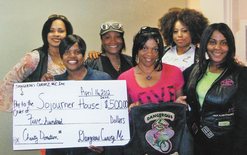 Dangerous Curvez MC is an all-female local motorcycle club of professional women. The group has participated in and sponsored many fundraisers in the community and recently presented a donation to Audrey Walker, front row, left, of Soujourner House, a shelter for battered women. Also in the front row are Gwen “Sugafree” Bell, club president, and Camesha “Hypnotic” Edmonds, vice president. In the back row, from left, are Yatasha “Freeway” Jefferson, treasurer; Sondra “Honey” Jones, co-founder; and Melanie “SweetH20” Ross, business manager.