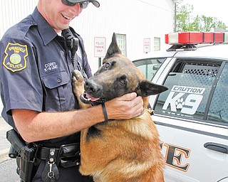 Springfield Township’s first police dog, Dany, pictured here with his handler Officer Glenn Corey, reported for duty Tuesday.