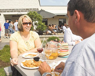 Lisa Grafton of Hinckley and Gary Poage of Salem enjoy wine at Mastropiétro Winery.
