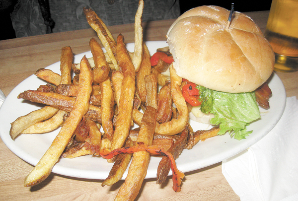 The Dagwood Burger, modified with roasted red peppers and bacon at Mike's Penn Ave. Grille in Salem.