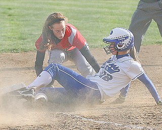 The Poland softball team is making its third straight trip to state — its fourth in school history. The Bulldogs lead-off batter Marissa Trevis (12), above, has a .475 batting average and is hitting .593 with runners in scoring position.