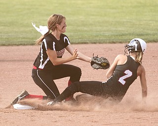 ROBERT K. YOSAY | THE VINDICATOR..Easy Out - as Matthews Jessica Marsico puts out #2 Casey Yingst at second base as she tried to steal - in the first innning -=..A couple of bloop hits combined with a three-base error on a sacrifice bunt to propel the Mathews High softball team to its biggest game in school history..Junioir shortstop Jessica Marsico drove in two runs plus made a sliding catch in right field in the seventh inning to help the Mustangs defeat Covington, 5-3, in ThursdayÕs Division IV state semifinal game at Firestone Stadium.. - -30-..
