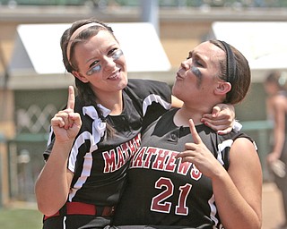 ROBERT K. YOSAY | THE VINDICATOR..Happy Days to STATE - #2 Olivia Rhondanz and Jacki Rhine celebrate after beating Covington to advance to the state championshp .A couple of bloop hits combined with a three-base error on a sacrifice bunt to propel the Mathews High softball team to its biggest game in school history..Junioir shortstop Jessica Marsico drove in two runs plus made a sliding catch in right field in the seventh inning to help the Mustangs defeat Covington, 5-3, in ThursdayÕs Division IV state semifinal game at Firestone Stadium.. - -30-..