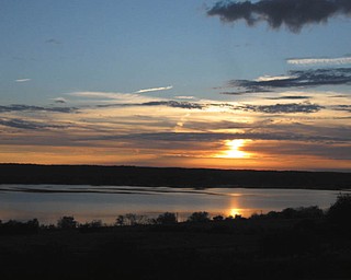Cathy Duck of Struthers sent in this photo taken on the way to the Finger Lakes, N.Y., region. She uses it as her screen saver at work, saying, "When I look at this sunset, a sense of calm comes over me."