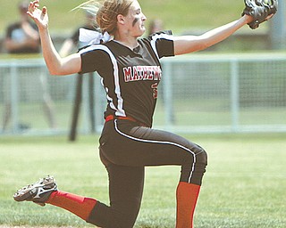 Mathews shortstop Jessica Marsico makes a sliding catch in right field during the seventh inning of the Division IV state softball semifinal against Covington on Thursday at Firestone Stadium in Akron. A couple of bloop hits combined with a three-base error on a sacrifice bunt to propel the Mustangs to a 5-3 win in their biggest game to date in school history. Marsico drove in two runs.