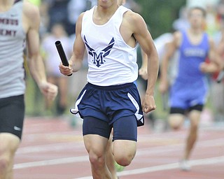 Allan Coviello of McDonald sprint down the track during the boys 4x800 race Friday morning at the State Track Meet in Columbus. McDonald would finish seventh in the 4x800.