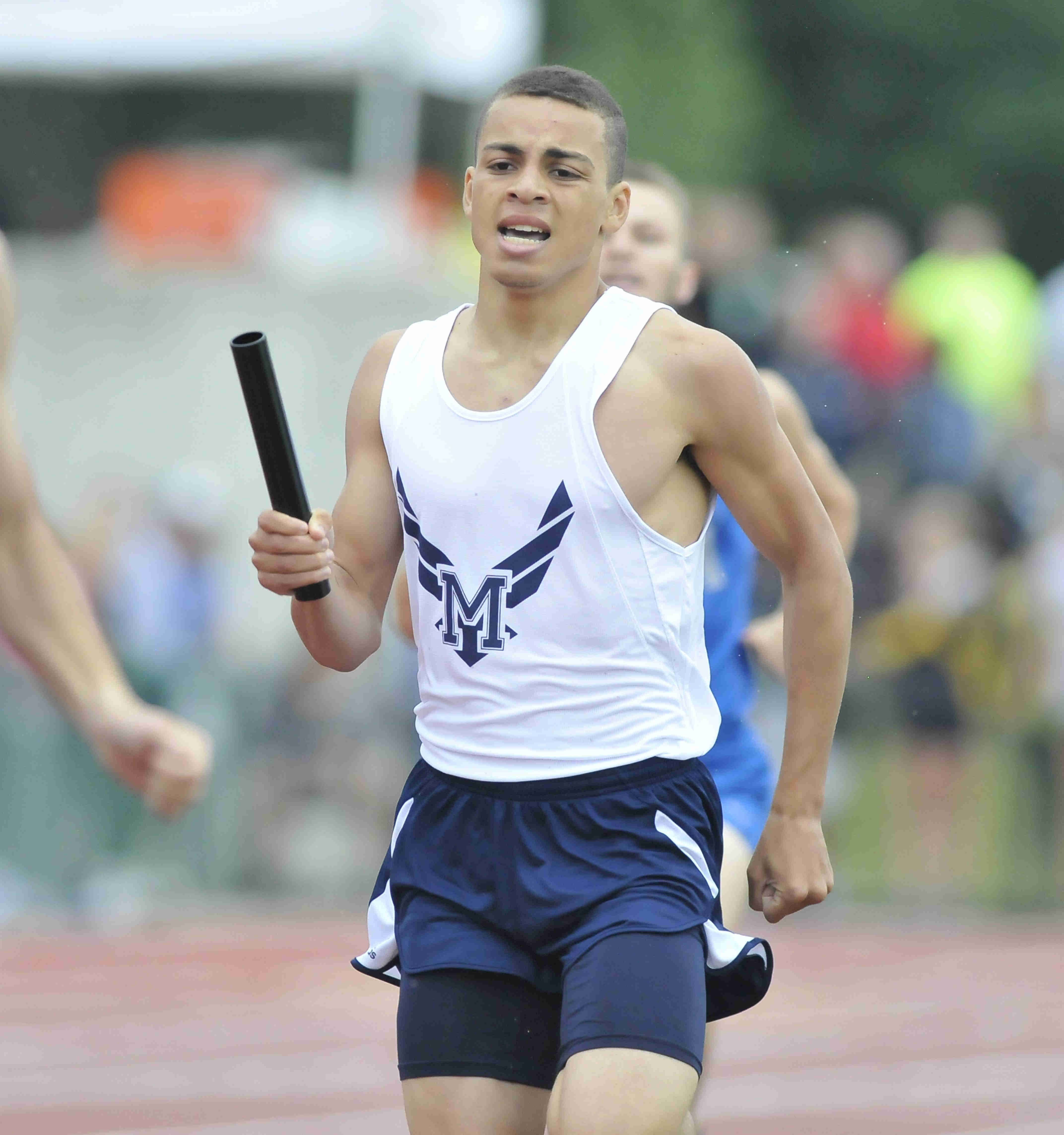 Allan Coviello of McDonald sprint down the track during the boys 4x800 race Friday morning at the State Track Meet in Columbus. McDonald would finish seventh in the 4x800.