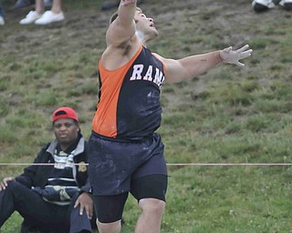 Jacob Chiclowe of Mineral Ridge throws the shot put Friday afternoon at the State Track Meet in Columbus.