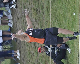 Jacob Chiclowe of Mineral Ridge throws the shot put Friday afternoon at the State Track Meet in Columbus.